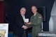 Mr. William Callaway, 8th Air Force Historian, presents Major General Michael Fortney, Air Force Global Strike Command vice commander, Barksdale Air Force Base, La, April 18, 2016, with a replica of the Congressional Gold Medal that was given to the Doolittle Raiders. It is the highest civilian honor Congress can give. The medal will be on display at the 8th Air Force Museum at Barksdale Air Force Base, La. (U.S. Air Force photo by Master Sgt. Laura Siebert/Released)
