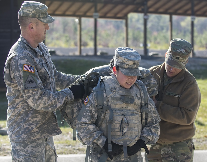 Spc. Kayla Bundy, 1st Bn., 414th Inf. Reg., 95th Training Division (IET), gets a bit of help removing her ruck after completing a 10-mile forced march during the 2016 108th Training Command (IET) Best Warrior competition held at Fort Jackson, S.C., March 21. This year's Best Warrior competition determined the top NCO and junior enlisted Soldier who will represent the 108th Training Command (IET) at the Army Reserve Drill Sgt. of the Year competition later this year at Fort Bragg, N.C. Bundy was selected to represent the 108th in the junior enlisted competition. (U.S. Army photo by Sgt. 1st Class Brian Hamilton/released)