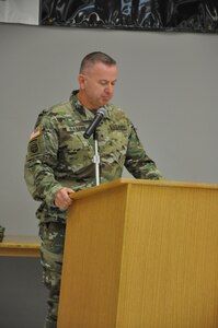 Army Reserve Brig. Gen. Vincent B. Barker, commanding general of the 310th Sustainment Command (Expeditionary), addresses and the Soldiers of the 643rd Regional Support Group during their change of command ceremony, April 9 at the Whitehall, Ohio, Army Reserve Center. Col. Stephen R. Smith, formerly the chief of staff for the 310th ESC, is taking over command of the 643rd RSG from Col. William J. McLaen.