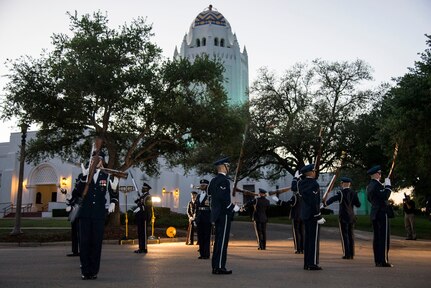 The Air Force Honor Guard Drill Team performs during the Air Education and Training Command Fiesta Reception April 13 at Joint Base San Antonio-Randolph. Over the past century, Fiesta has grown into a celebration of San Antonio's rich and diverse cultures. During the event military representatives throughout San Antonio participate in receptions, parades, pilgrimages and memorials.