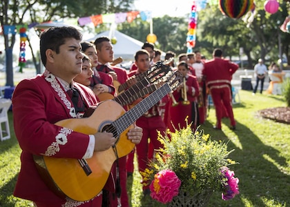 A mariachi band gets ready to perform April 13 during the Air Education and Training Command Fiesta Reception at Joint Base San Antonio-Randolph. Over the past century, Fiesta has grown into a celebration of San Antonio's rich and diverse cultures. During the event military representatives throughout San Antonio participate in receptions, parades, pilgrimages and memorials.