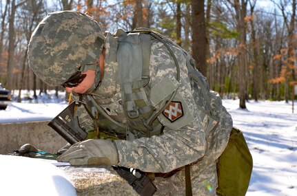 SPC Jordan Gates plots points on his map as he prepares for the daytime land navigation course at Fort Devens, Mass. Gates, a native of Asheville N.C., was among 11 Soldiers from across the 377th TSC vying for the command’s Best Warrior title and the opportunity to represent the command at the U.S. Army Reserve Command competition at Fort Bragg, N.C. May 1-7, 2016.