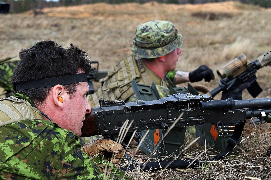 Canadian soldiers fire at targets during the live-fire portion of a breaking contact and trench clearing exercise, part of Summer Shield XIII at Adazi Military Base, Latvia, April 19, 2016. Army photo by Sgt. Paige Behringer