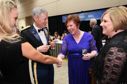 151017-N-HW977-214 RIVERSIDE, Calif. (Oct. 17, 2015) Kim Kruzel, Naval Surface Warfare Center (NSWC), Corona Division comptroller, right, and Laura Hewitt, Performance Assessment Department head, greet Sam Frazier, NSWC Corona legal counsel, and his daughter before inaugural Inland Empire Navy Birthday Ball. The sold-out event, to commemorate the Navy's 240th birthday, included dinner, ceremonies, music, dancing and a keynote address by U.S. Representative Ken Calvert (R-Corona). All proceeds will benefit the Navy-Marine Corps Relief Society. (U.S. Navy photo by Greg Vojtko)

PUBLIC RELEASE REVIEW:

Public Affairs:  PAO Troy Clarke  signature  _________________________ date ________