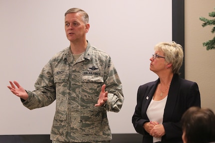 160408-N-HW977-089 MARCH AIR RESERVE BASE, Calif. (April 8, 2016) Brig. Gen. Russell Muncy, commander, 452nd Air Mobility Wing, left, and Dianne Costlow, Naval Surface Warfare Center (NSWC), Corona Division deputy technical director, respond to questions during Leadership Riverside Military and Homeland Security Day event. Costlow briefed the local business leaders on NSWC Corona's mission to enable warfighters to train, fight and win through measurement, analysis and independent assessment, as well as its economic and social contributions to the region. (U.S. Navy photo by Greg Vojtko/Released)