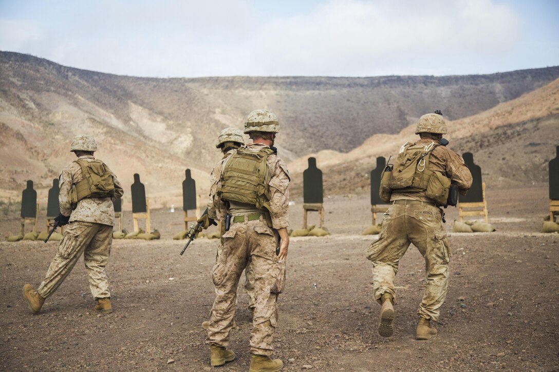 Marines pivot to the right while engaging targets during live-fire training in Djibouti, April 14, 2016. The Marines are assigned to the 13th Marine Expeditionary Unit. Marine Corps photo by 1st Lt. Francheska Soto