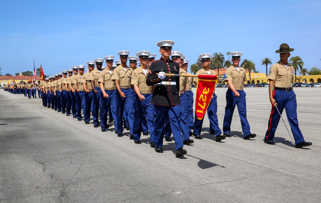 Marines from Mike Company, 3rd Recruit Training Battalion, march across the parade deck during a graduation ceremony at Marine Corps Recruit Depot San Diego, April 15. Graduation takes place at the completion of a 13-week transformation including training in drill, marksmanship, basic combat skills and Marine Corps customs and traditions. Annually, more than 17,000 males recruited from the Western Recruiting Region are trained at MCRD San Diego.