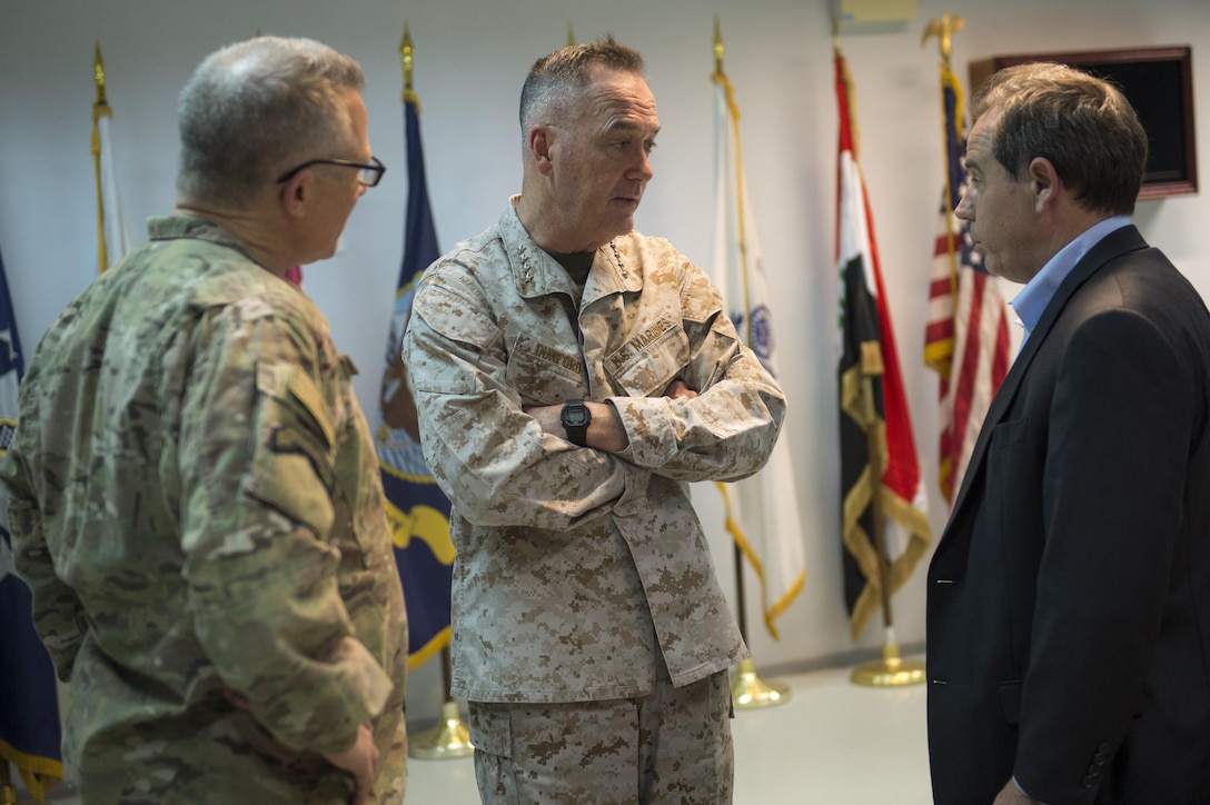 Marine Corps Gen. Joe Dunford, chairman of the Joint Chiefs of Staff, center, speaks to U.S. Ambassador to Iraq Stuart E.Jones, right, and Army Gen. Paul J. LaCamera, chief, Office of Security Cooperation - Iraq, after arriving in Baghdad, April 20, 2016. DoD photo by Navy Petty Officer 2nd Class Dominique A. Pineiro