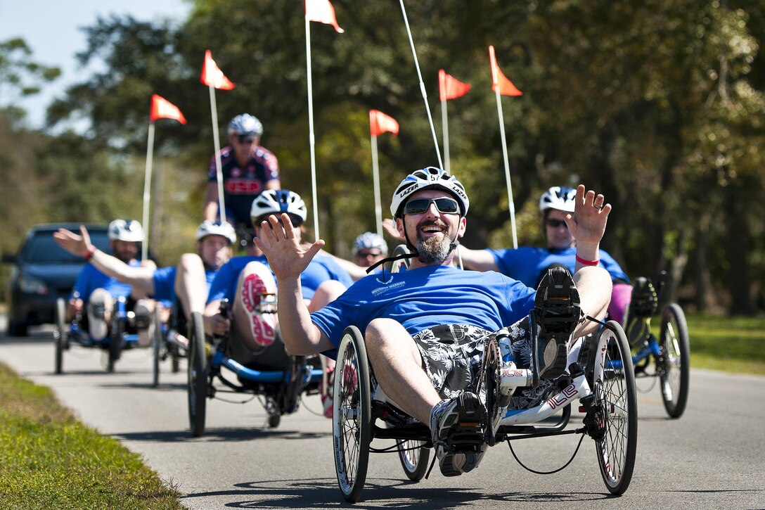 Dustin Goodwin, a Warrior Games athlete, pedals a “hands-free” recumbent bike during a morning cycling session at the adaptive sports camp at Eglin Air Force Base, Fla., April 5, 2016. Air Force photo by Samuel King Jr.