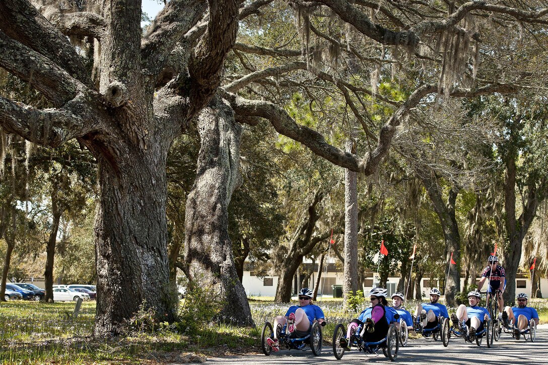 Warrior Games athletes ride recumbent bikes during a morning cycling session at the adaptive sports camp at Eglin Air Force Base, Fla., April 5, 2016. Air Force photo by Samuel King Jr.