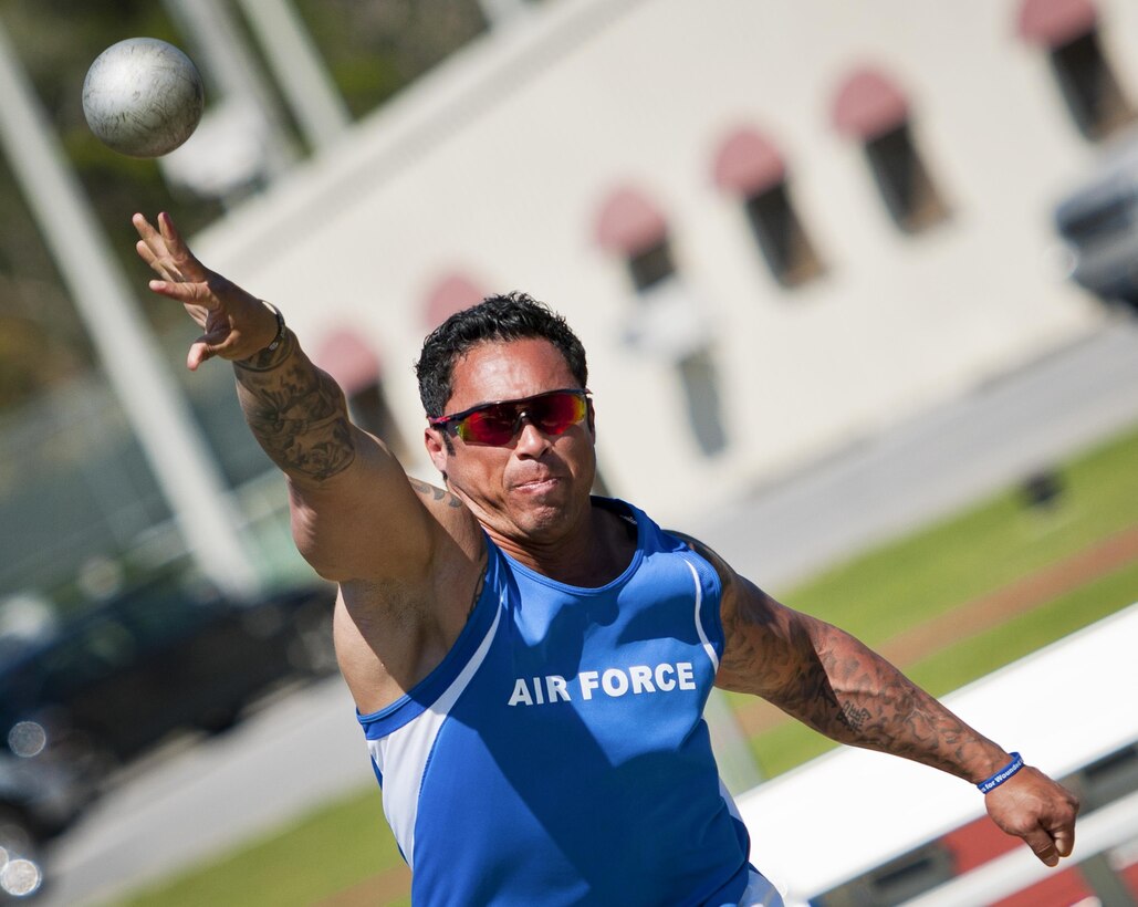 Christopher Ferrell, a Warrior Games athlete, releases the shot put during a track and field session at the Air Force team’s training camp at Eglin Air Force Base, Fla., April 5, 2016. Air Force photo by Samuel King Jr.