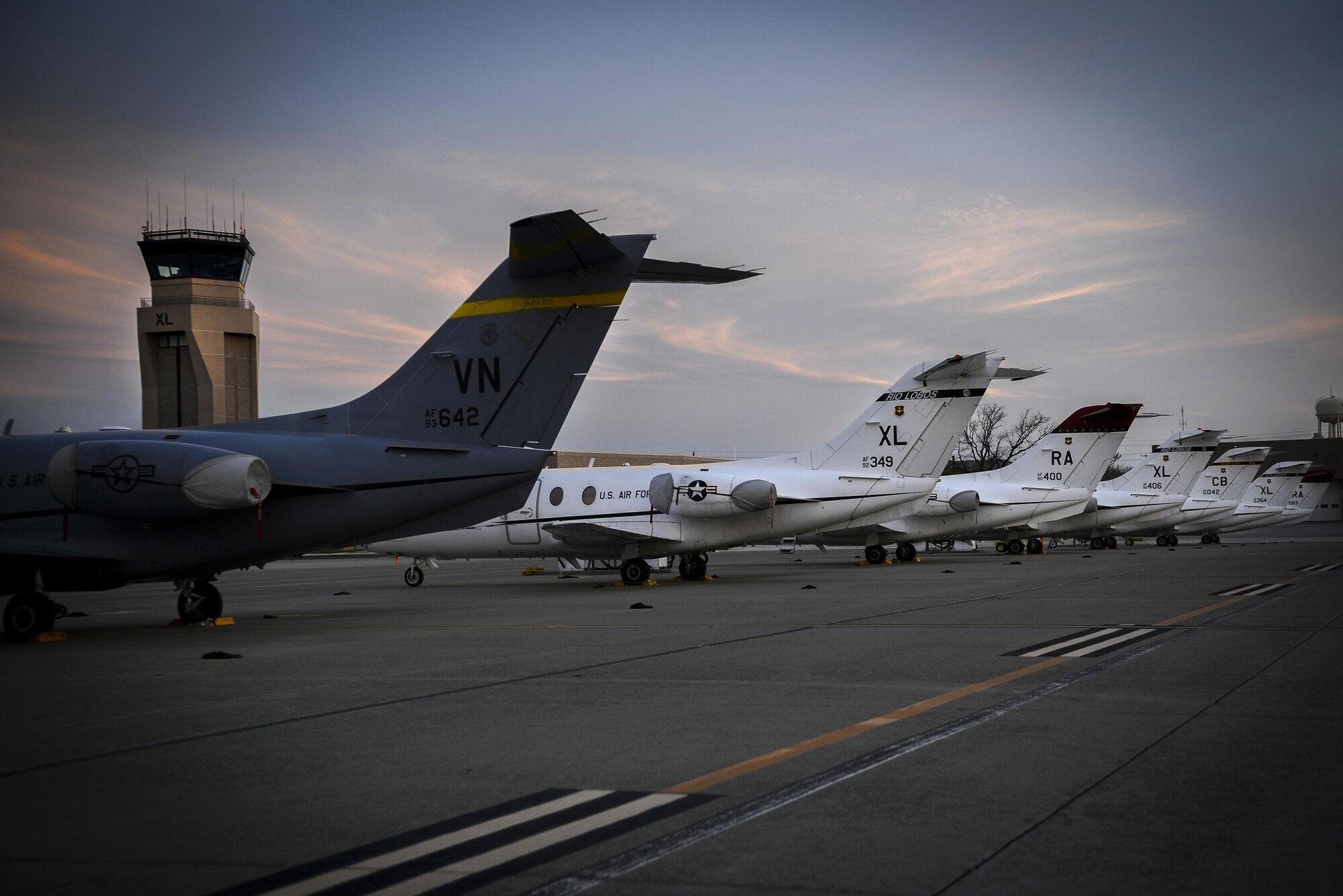 T-1A Jayhawks from throughout the Air Education and Training Command sit on the flight line of Laughlin Air Force Base, Texas, March 15, 2016. Training bases - including Vance AFB, Okla., Joint Base San Antonio-Randolph AFB, Texas and Columbus AFB, Miss. – loaned some of their aircraft to help continue student pilot training after a devastating hail storm damaged Laughlin’s aircraft. The support received helps Laughlin complete its primary mission: to graduate the world’s best military pilots. (U.S. Air Force photo by Senior Airman Ariel D. Partlow)