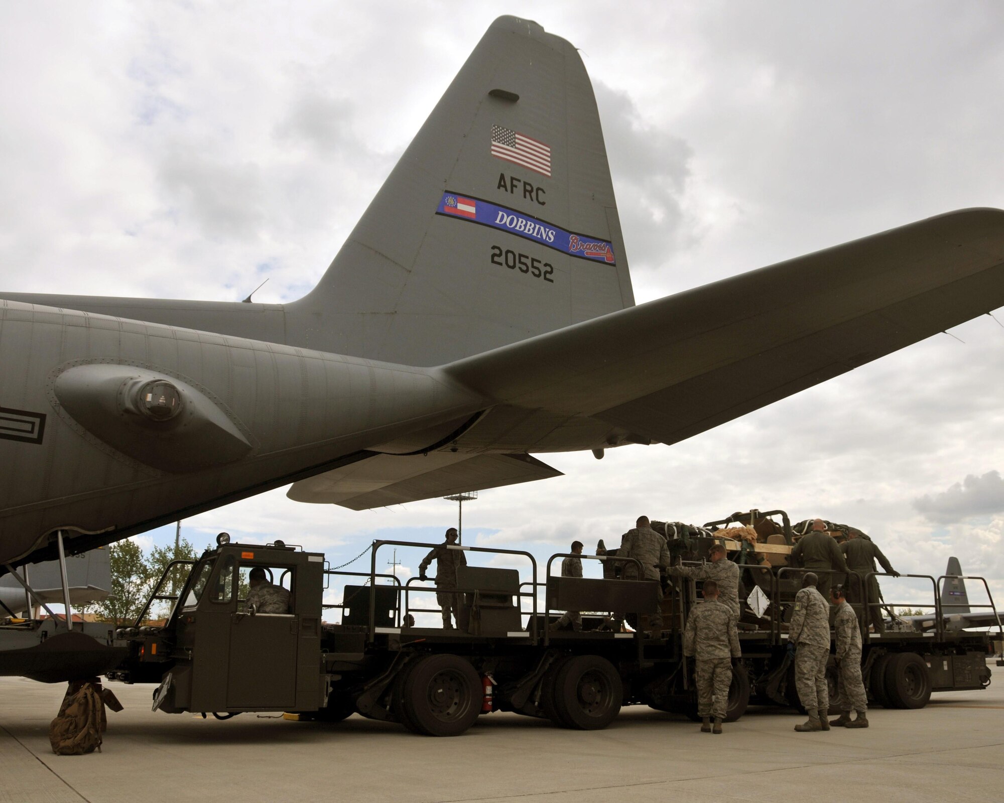 A load team uses a K-Loader to load a Humvee into the cargo area of a C-130 Hercules at Aviano Air Base, Italy on April 10, 2016. The Humvee was then air dropped over Hohenfels Training Area, Germany in support of Exercise Saber Junction 16. (U.S. Air Force photo/ Senior Airman Andrew J. Park)
