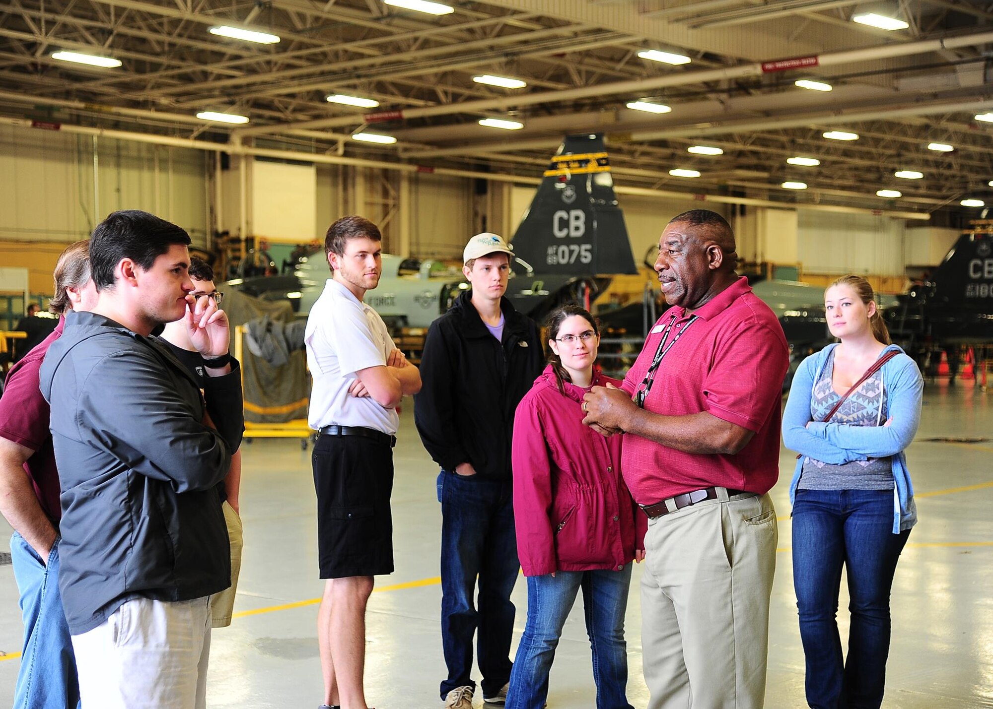 Randy Mastin, 14th Flying Training Wing Aircraft Maintenance T-38C Talon Foreman, explains various features of the T-38C Talon to the Mississippi State University Aerospace Engineering class during a tour April 12 on Columbus Air Force Base, Mississippi. The students were able to get a closer look at the United States Air Force trainer aircraft and its cockpit. (U.S. Air Force photo/Senior Airman Stephanie Englar)