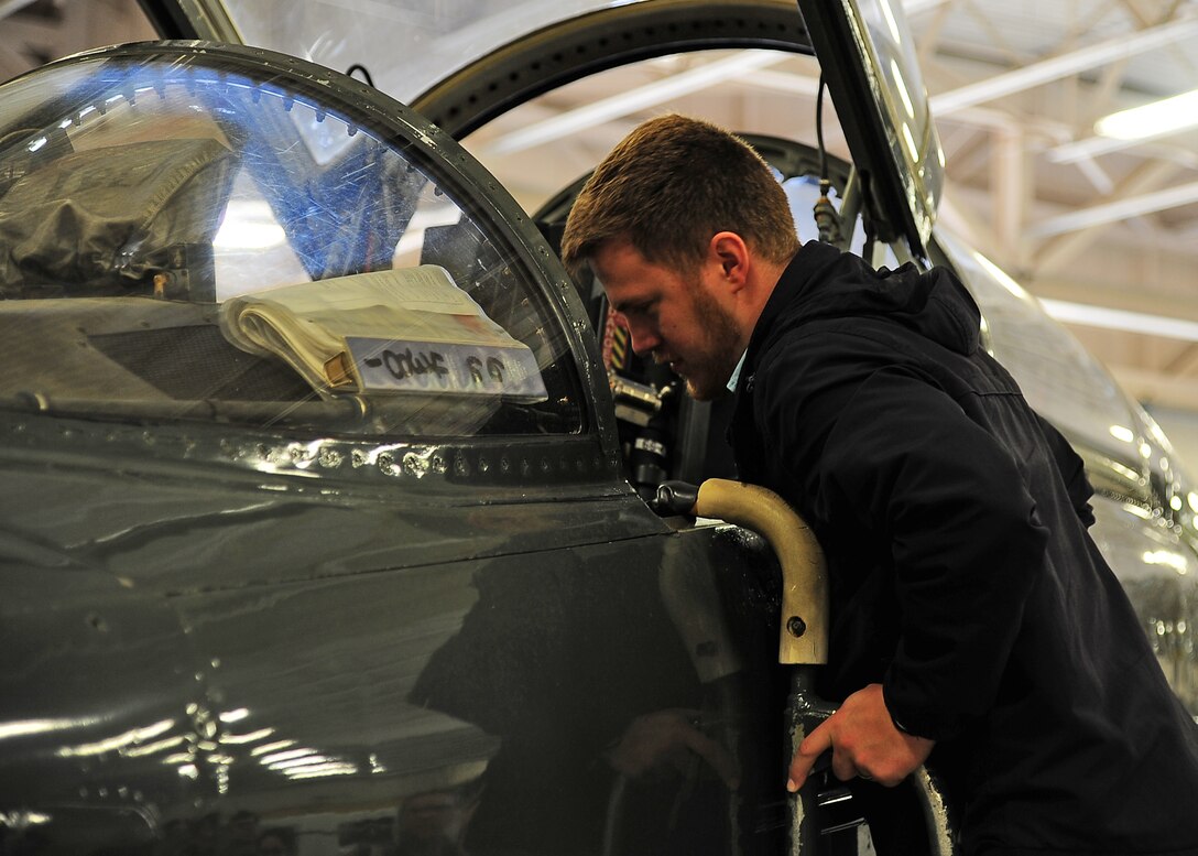 Joseph Brown, Mississippi State University senior, looks at the cockpit of a T-38C Talon during a tour April 12 on Columbus Air Force Base, Mississippi. The engineering students were given the opportunity to see aspects of what they have learned in a real-life setting. (U.S. Air Force photo/Senior Airman Stephanie Englar)