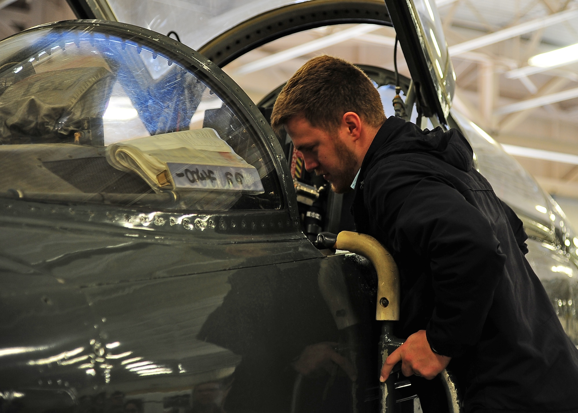 Joseph Brown, Mississippi State University senior, looks at the cockpit of a T-38C Talon during a tour April 12 on Columbus Air Force Base, Mississippi. The engineering students were given the opportunity to see aspects of what they have learned in a real-life setting. (U.S. Air Force photo/Senior Airman Stephanie Englar)