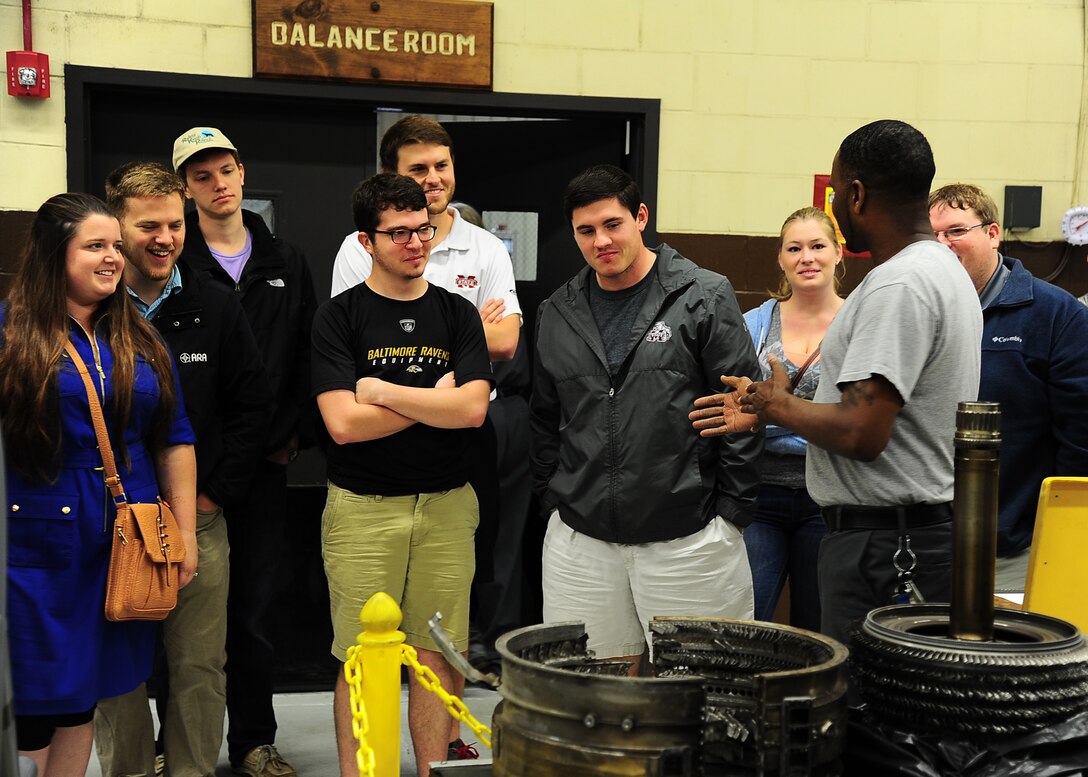 Rodney Williams, Engine Leadman with L-3 Communications, explains his job and role in the 14th Flying Training Wing mission to the Aerospace Engineering class from Mississippi State University during a tour April 12 on Columbus Air Force Base, Mississippi. The class toured the BLAZE hangar, propulsions lab, and the T-38C Talon test cell. (U.S. Air Force photo/Senior Airman Stephanie Englar)