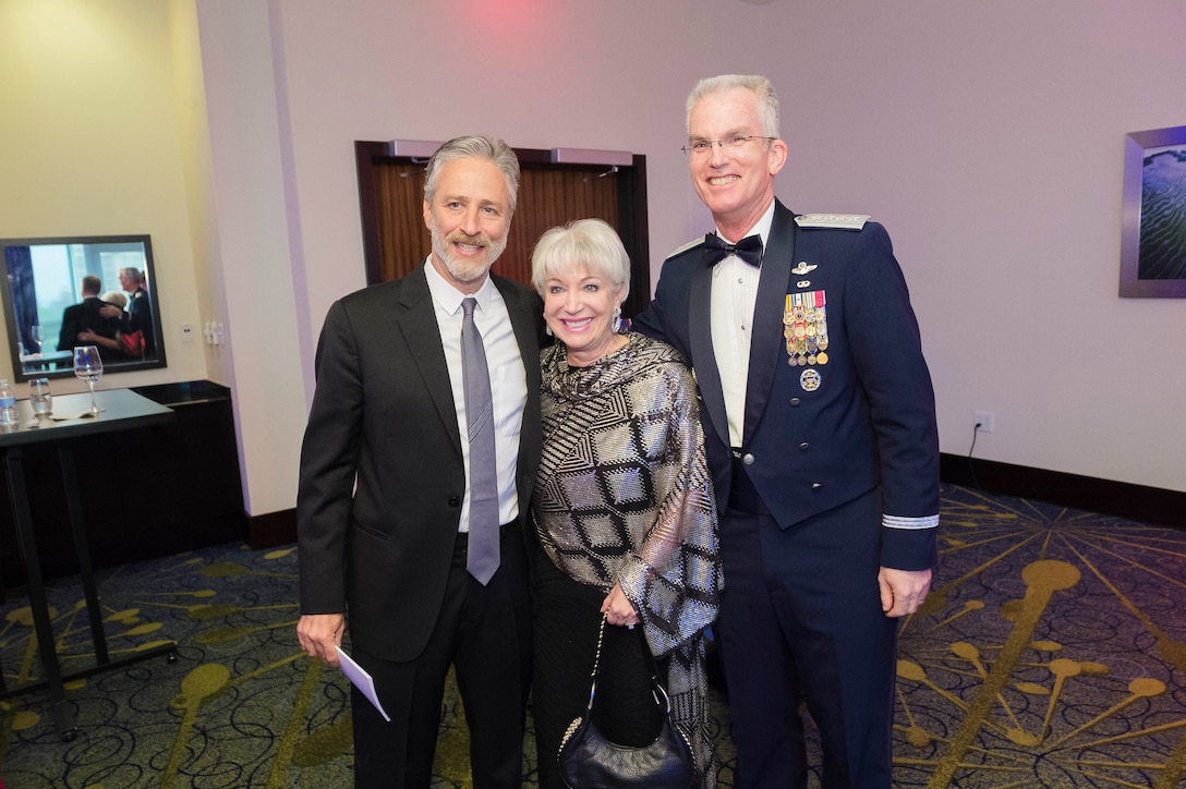 Air Force Gen. Paul J. Selva, vice chairman of the Joint Chiefs of Staff, stands for a photo with Elaine Rogers, president and CEO of USO of Metropolitan Washington-Baltimore; and comedian Jon Stewart during the organization’s annual awards dinner in Arlington, Va., April 19, 2016. Stewart served as master of ceremonies for the event. DoD photo by Army Staff Sgt. Sean K. Harp