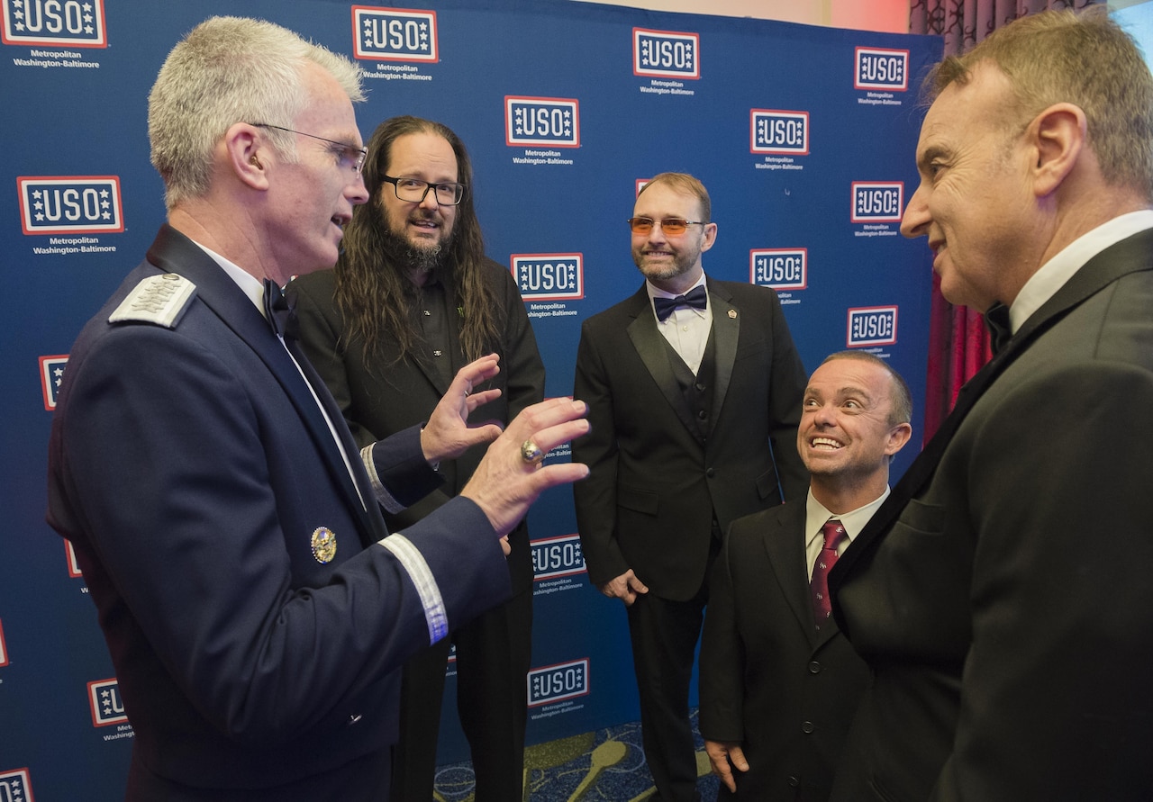 Air Force Gen. Paul J. Selva, vice chairman of the Joint Chiefs of Staff, speaks with actor Jason "Wee Man" Acuna during the USO of Metropolitan Washington-Baltimore annual awards dinner in Arlington, Va., April 19, 2016. DoD photo by Army Staff Sgt. Sean K. Harp