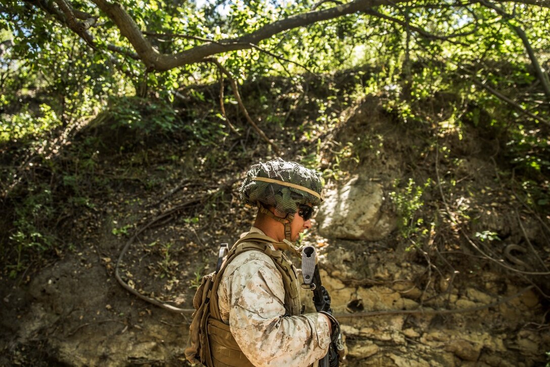 MARINE CORPS BASE CAMP PENDLETON, Calif. – Pfc. Andres Bravo, rifleman, Company K, 3rd Battalion, 1st Marine Regiment, 1st Marine Division, patrols to his squad’s objective during squad tactics training on Camp Pendleton April 19, 2016. The training is a week-long package designed to help develop squads into an effective, cohesive unit. Bravo is 21 years old and is from Los Angeles. (U.S. Marine Corps photo by Sgt. Emmanuel Ramos/Released)