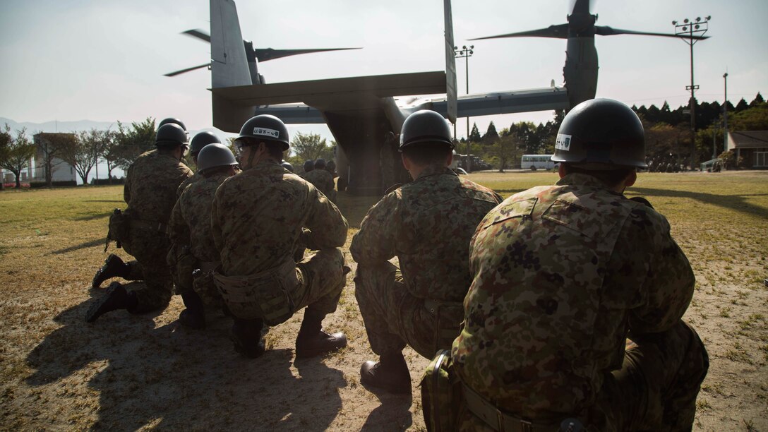 U.S. Marines assigned to Marine Medium Tiltrotor Squadron 265 (Reinforced), 31st Marine Expeditionary Unit, and Japan Self-Defense Force members deliver earthquake relief supplies to Hakusui Sports Park in island of Kyushu, Japan April 19, 2016. The supplies are in support of the relief effort after a series of earthquakes struck the island of Kyushu. The 31st MEU is the only continually forward-deployed MEU and remains the Marine Corps' force-in-readiness in the Asia-Pacific region. 