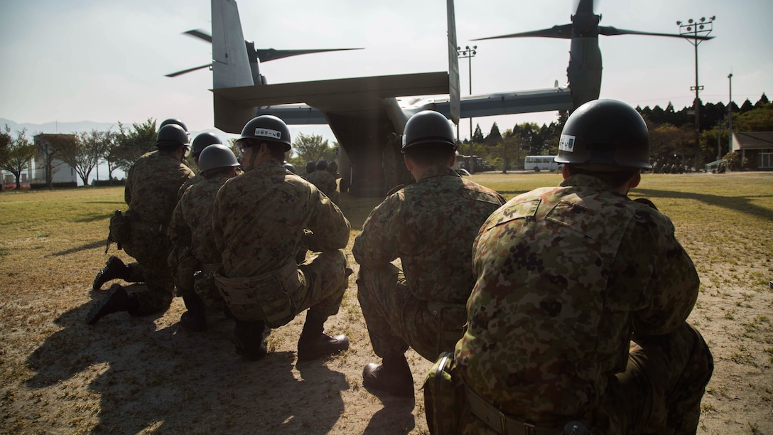 U.S. Marines assigned to Marine Medium Tiltrotor Squadron 265 (Reinforced), 31st Marine Expeditionary Unit, and Japan Self-Defense Force members deliver earthquake relief supplies to Hakusui Sports Park in island of Kyushu, Japan April 19, 2016. The supplies are in support of the relief effort after a series of earthquakes struck the island of Kyushu. The 31st MEU is the only continually forward-deployed MEU and remains the Marine Corps' force-in-readiness in the Asia-Pacific region. 