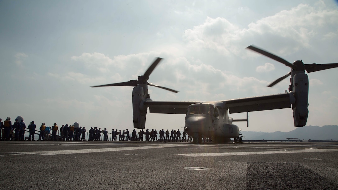 Marines assigned to Marine Medium Tiltrotor Squadron 265 (Reinforced), 31st Marine Expeditionary Unit, and Japan Self-Defense Force members transport supplies onto an MV-22B Osprey aboard the JS Hyuga (DDH 181), April 19, 2016. The supplies are in support of the relief effort after a series of earthquakes struck the island of Kyushu. The 31st MEU is the only continually forward-deployed MEU and remains the Marine Corps' force-in-readiness in the Asia-Pacific region. 