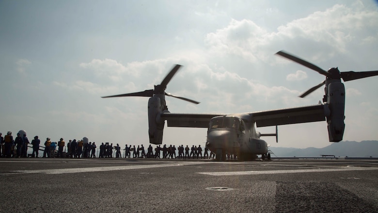 Marines assigned to Marine Medium Tiltrotor Squadron 265 (Reinforced), 31st Marine Expeditionary Unit, and Japan Self-Defense Force members transport supplies onto an MV-22B Osprey aboard the JS Hyuga (DDH 181), April 19, 2016. The supplies are in support of the relief effort after a series of earthquakes struck the island of Kyushu. The 31st MEU is the only continually forward-deployed MEU and remains the Marine Corps' force-in-readiness in the Asia-Pacific region. 