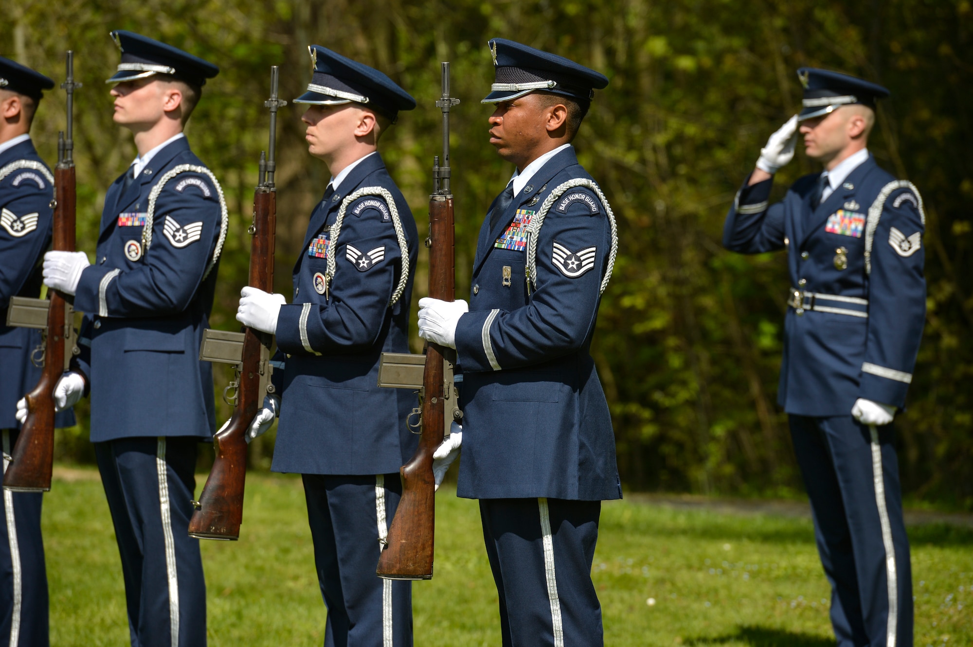 PARIS - A U.S. Air Force Honor Guard fire team from Spangdahlem Air Base, Germany, awaits the command to perform a 21-gun salute during the Lafayette Escadrille Memorial 100th anniversary ceremony in Marnes-la-Coquette, France, April 20, 2016. More than 200 Americans flew with France in the Lafayette Flying Corps prior to U.S. entry into World War I. Airmen from the USAF and their French counterparts, along with civilians from both countries, paid tribute to the men who served and the sacrifices of the 68 American airmen who died fighting with the French in World War I. The memorial highlights the 238-year alliance between the U.S. and France with their long history of shared values and sacrifice. (U.S. Air Force Photo by Tech. Sgt. Joshua DeMotts/Released)