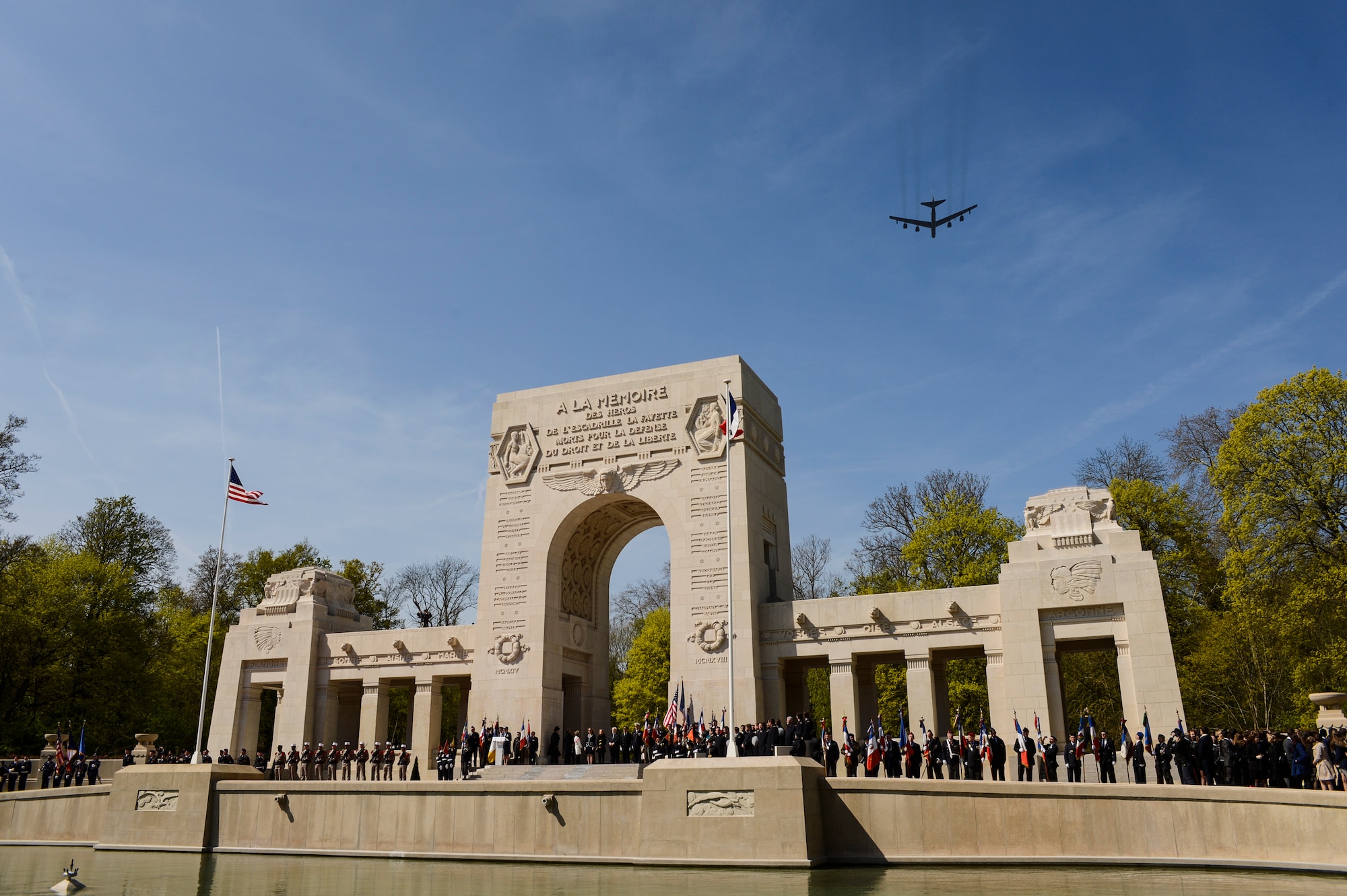 PARIS – A U.S. Air Force B-52 Stratofortress bomber flies over the Lafayette Escadrille Memorial in Marnes-la-Coquette, France, April 20, 2016, during a ceremony honoring the 268 Americans who joined the French Air Force before the U.S. officially engaged in World War I. In addition to the B-52, four USAF fifth generation F-22 Raptor fighters, three FAF Mirage 2000Ns, one FAF Rafale and a World War I-era Stearman PT-17 biplane performed flyovers during the ceremony commemorating the 100th anniversary of the Layfette Escadrille’s formation. Men of the Lafayette Escadrille and Lafayette Flying Crops were critical to the formation of the USAF. (U.S. Air Force Photo by Tech. Sgt. Joshua DeMotts/Released)