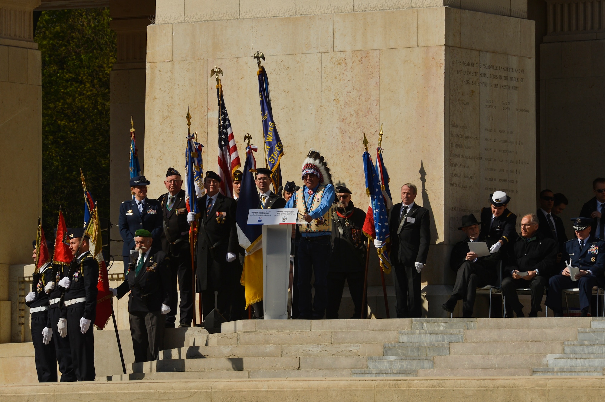 PARIS – John Yellow Bird Steele, representing the Sioux Nation, offers a traditional Native American incantation during the Lafayette Escadrille Memorial 100th anniversary ceremony in Marnes-la-Coquette, France, April 20, 2016. More than 200 Americans flew with France in the Lafayette Flying Corps prior to U.S. entry into World War I. Airmen from the U.S. Air Force and their French counterparts, along with civilians from both countries attended the ceremony to honor the men who served and the sacrifices of the 68 American airmen who died fighting with the French in World War I. The memorial highlights the 238-year alliance between the U.S. and France with their long history of shared values and sacrifice. (U.S. Air Force Photo by Tech. Sgt. Joshua DeMotts/Released)