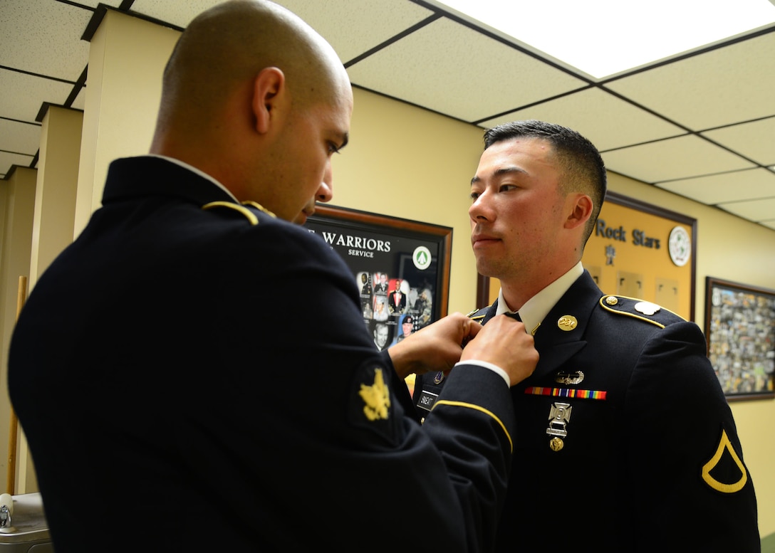 U.S. Army Spc. David Dell, a cargo specialist assigned to the 689th Rapid Port Opening Element, reports to the command sergeant major and first sergeant’s board during the 597th Transportation Brigade Best Warrior competition at Fort Eustis, Va., April 15, 2016. The evaluation board was compromised of battalion command sergeant majors and first sergeants. (U.S. Air Force photo by Staff Sgt. J.D. Strong II)