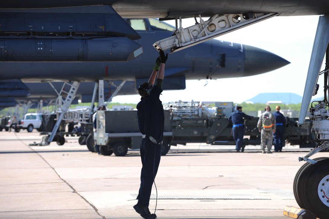 U.S. Air Force Staff Sgt. Robert Gallagher, 7th Aircraft Maintenance Squadron crew chief, raises the step ladder on a B-1B Lancer during Exercise Constant Vigilance 16, April 10, 2016, at Dyess Air Force Base, Texas. Constant Vigilance 16 involved both command and control elements and operations units throughout Air Force Global Strike Command, designed to exercise the command’s ability to support its conventional and nuclear missions. (U.S. Air Force photo by Airman 1st Class Rebecca Van Syoc/Released)