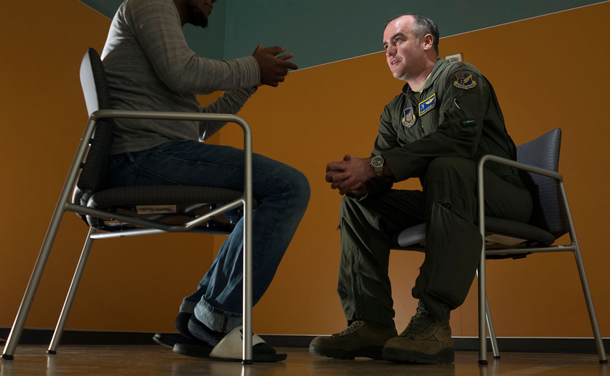 U.S. Air Force Maj. Craig McDowell, 611th Air Operations Squadron chief of combat plans, volunteers almost daily at Covenant House Alaska, an organization that helps homeless and struggling youth overcome life's hurdles. McDowell has been volunteering at CHA since early 2013. If he's not on a temporary duty assignment, he's volunteering, said Jennifer Piffarerio, CHA counseling psychologist. (U.S. Air Force photo by Justin Connaher)
