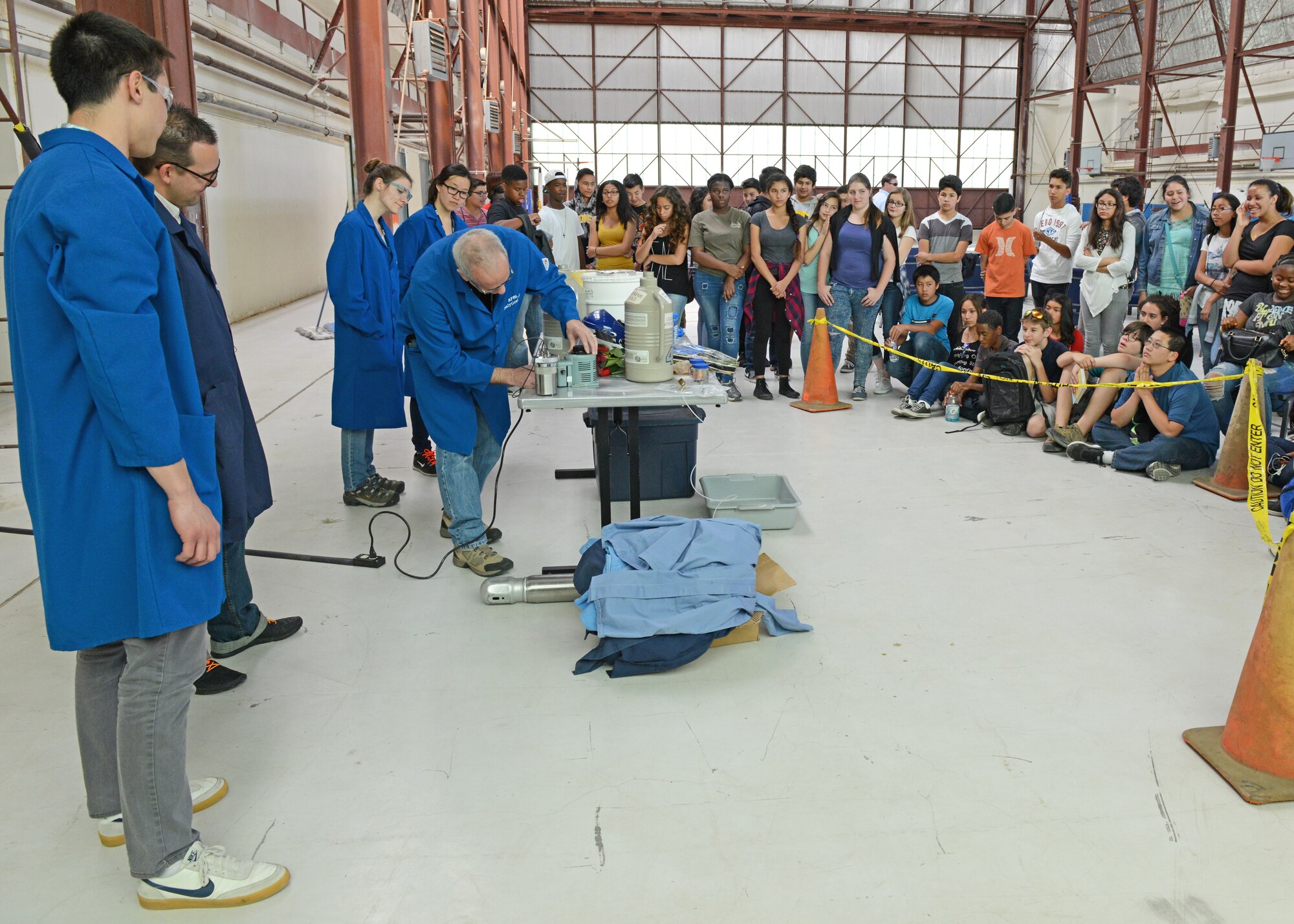 Rocket Lab scientists closed off the day with a chemicals demonstration. From lessons on chemical propellants to seeing actual rocket boosters that were launched, the 8th-graders from Discovery School in Lancaster, California, got a whirlwind tour of the “Rocket Lab” April 19. (U.S. Air Force photo by Kenji Thuloweit)
