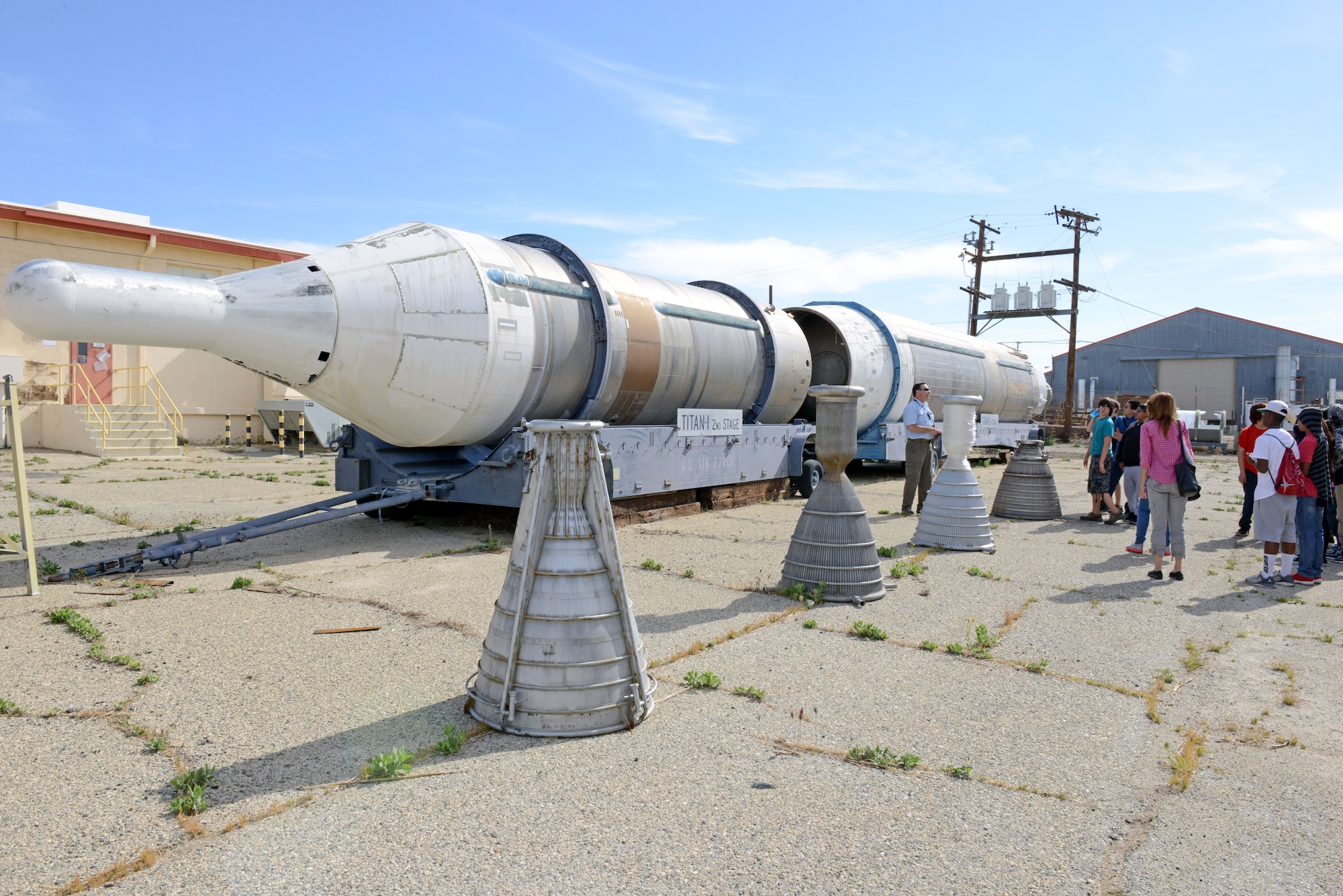 Students from Discovery School in Lancaster visit the Rocket Lab’s Heritage Room where the children got an up-close and personal look at old rocket boosters and engines, some both used and tested at Edwards. (U.S. Air Force photo by Kenji Thuloweit)