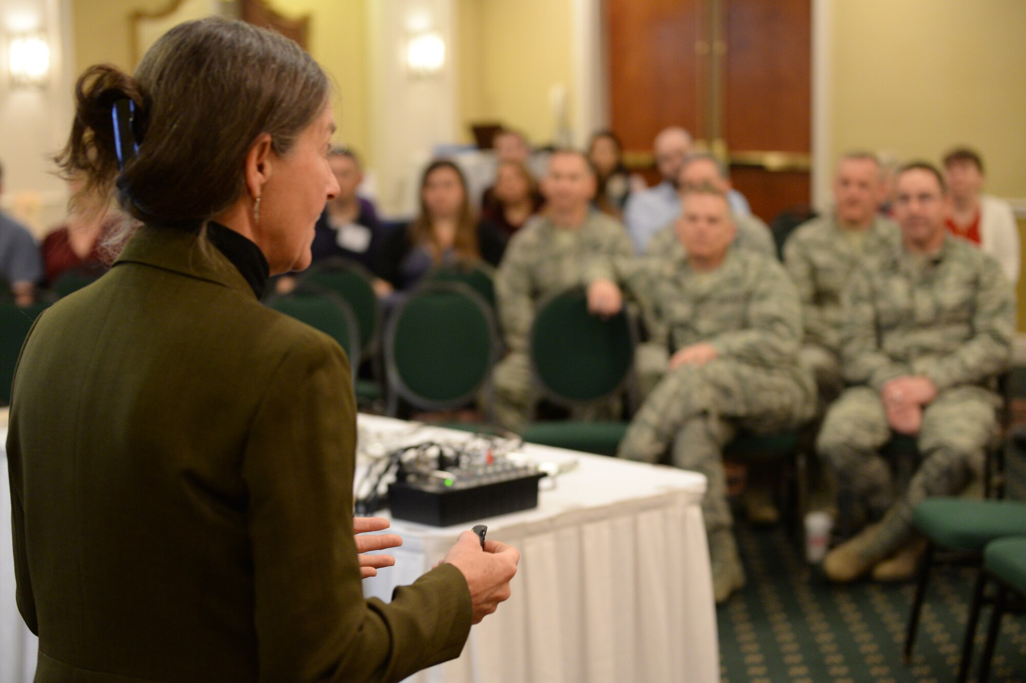 Retired U.S. Army Brig. Gen. Rhonda Cornum speaks with members of the military and their families about resilience at a Yellow Ribbon event in Portsmouth, N.H., April 2, 2016. The mission of the Yellow Ribbon Program is to promote the well-being of National Guard and Reserve service members and their families by connecting them with resources throughout their deployment cycle. (U.S. Air National Guard photo by Staff Sgt. Curtis J. Lenz)
