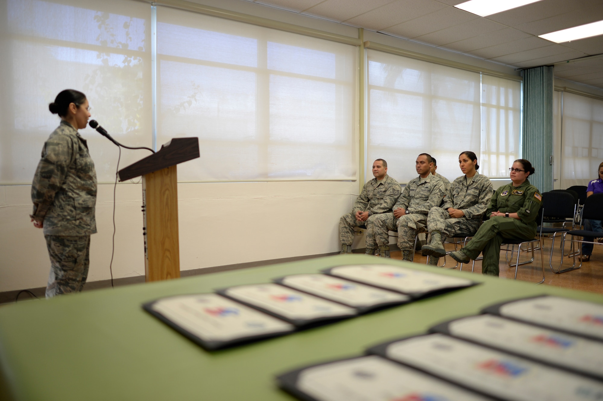 U.S. Air Force airmen of the 156th Airlift Wing receive recognition from Capt. Angela Feliciano, 156th AW SAPR Program coordinator, for their volunteer efforts and support of the Sexual Assault Prevention and Response Program during an appreciation breakfast held at Muñiz Air National Guard Base, Carolina, Puerto Rico, April 14. (U.S. Air National Guard photo by Staff Sgt. Christian Jadot)