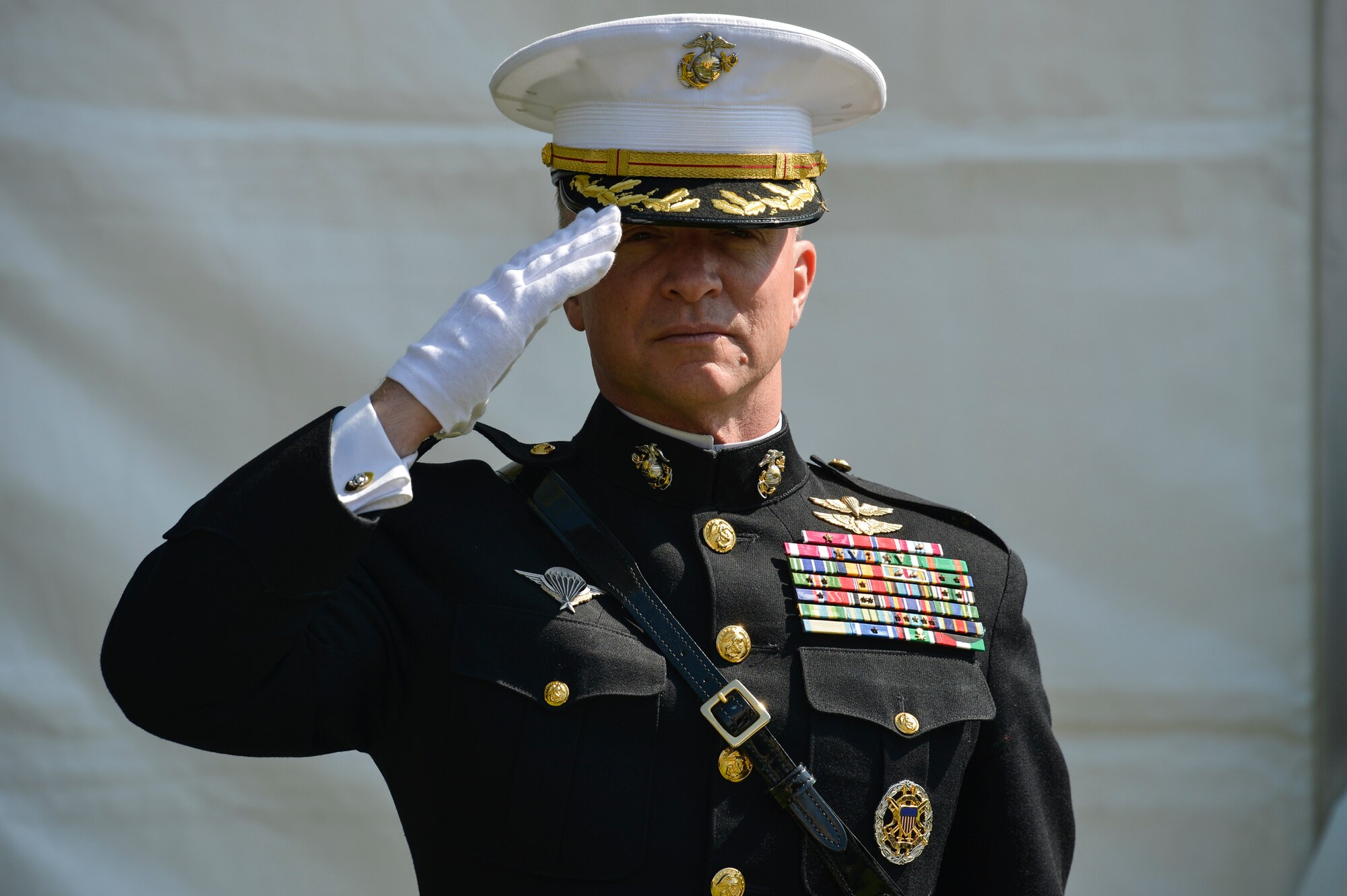 PARIS – U.S. Marine Corps Col. Philippe Rogers, USMC land forces planner for the U.S. military delegation to NATO, salutes as Taps plays during the Lafayette Escadrille Memorial 100th anniversary ceremony in Marnes-la-Coquette, France, April 20, 2016. More than 200 Americans flew with France in the Lafayette Flying Corps prior to U.S. entry into World War I. Airmen from the U.S. Air Force and their French counterparts, along with civilians from both countries, paid tribute to the men who served and the sacrifices of the 68 American airmen who died fighting with the French in World War I. The memorial highlights the 238-year alliance between the U.S. and France with their long history of shared values and sacrifice. (U.S. Air Force Photo by Tech. Sgt. Joshua DeMotts/Released)