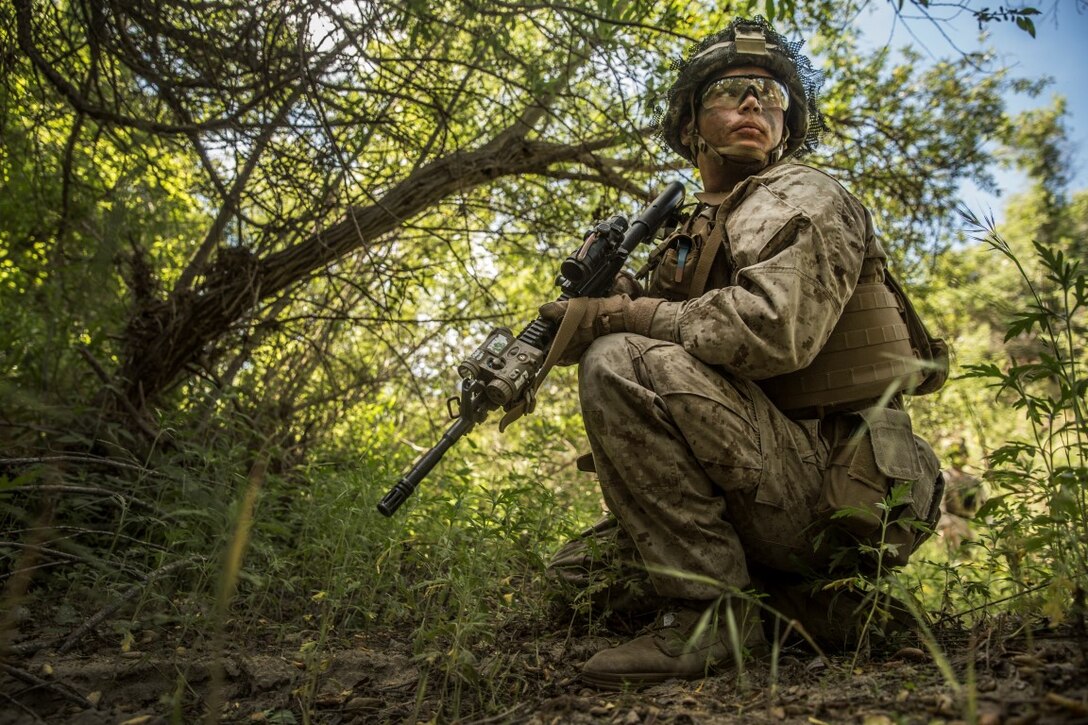 MARINE CORPS BASE CAMP PENDLETON, Calif. – Cpl. Jesse Meinhardt, squad leader, Company K, 3rd Battalion, 1st Marine Regiment, 1st Marine Division, looks down the line to observe his squad’s dispersion during squad tactics training on Camp Pendleton April 19, 2016. Meinhardt recently took on the role as squad leader. It’s a position he has been waiting to fill for nearly four years. Meinhardt is 22 years old and is from Auburn, Alabama. (U.S. Marine Corps photo by Sgt. Emmanuel Ramos/Released)
