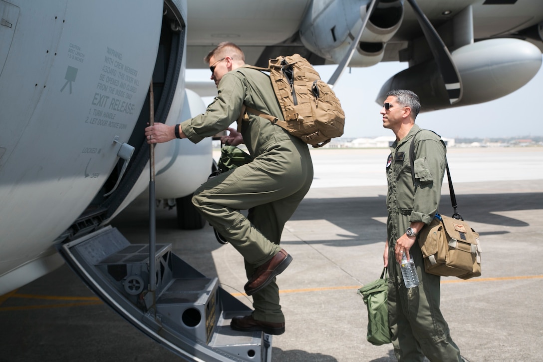Marines with the Marine Aerial Refueler Transport Squadron 152, Marine Aircraft Group 12, 1st Marine Aircraft Wing, III Marine Expeditionary Force board a KC-130J Super Hercules at Kadena Air Base to begin preparing for a training exercise Friday, April 15. The training included picking up supplies and Marines from 3rd Reconnaissance Battalion, 3rd Marine Division, III MEF from Ie Shima. Then the reconnaissance Marines practiced low-level static line training with the support of VMGR-152. (U.S. Marine photo by LCpl Amaia Unanue/Released)