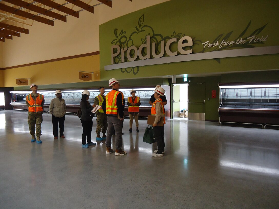 U.S. Army Corps of Engineers Japan District Iwakuni Resident Office and Marine Corps Air Station personnel inspect the new commissary building on April 1.