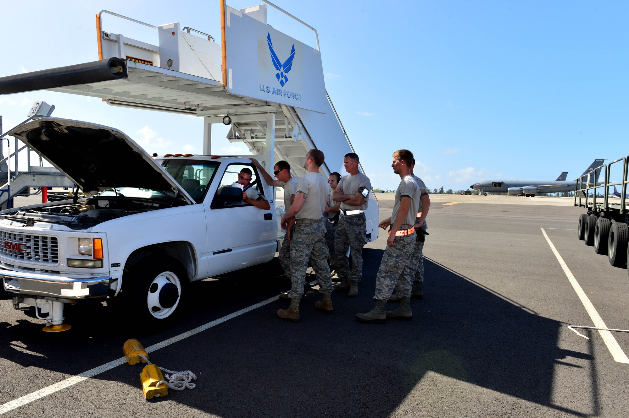 Airmen from the 32nd Aerial Port Squadron, Pittsburgh Air Reserve Station conduct an inspection of a staircase truck during annual training on Joint Base Pearl Harbor-Hickam, April 14, 2016. Approximately 30 Airmen from the 32nd APS traveled to JBPHH to conduct annual training hosted by the Airmen of the 735th Air Mobility Squadron. (U.S. Air Force photo by Tech. Sgt. Aaron Oelrich/Released)