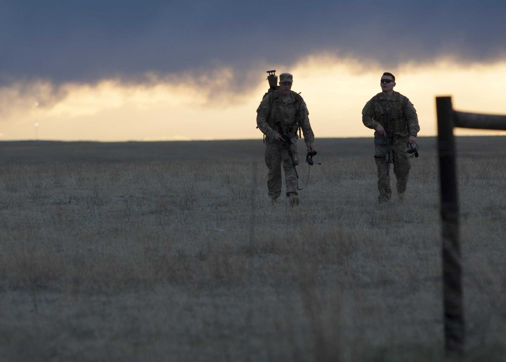 A 790th Missile Security Forces Squadron Tactical Response Force sniper team return to a rally point after completing a training exercise April 14, 2016, in the F.E. Warren Air Force Base, Wyo., Missile Complex. Training and exercise participation is critical to Air Force Global Strike Command’s ability to respond quickly and effectively to real-world situations. (U.S. Air Force Photo by Lan Kim)