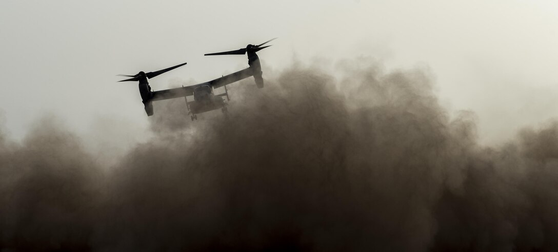 Combat Operations: A CV-22 Osprey takes off from a training drop zone to conduct freefall jump training with pararescuemen assigned to the 82nd Expeditionary Rescue Squadron and Marine force reconnaissance members assigned to the 15th Marine Expeditionary Unit in Djibouti, July 26, 2015. Army photo by Staff Sgt. Gregory Brook