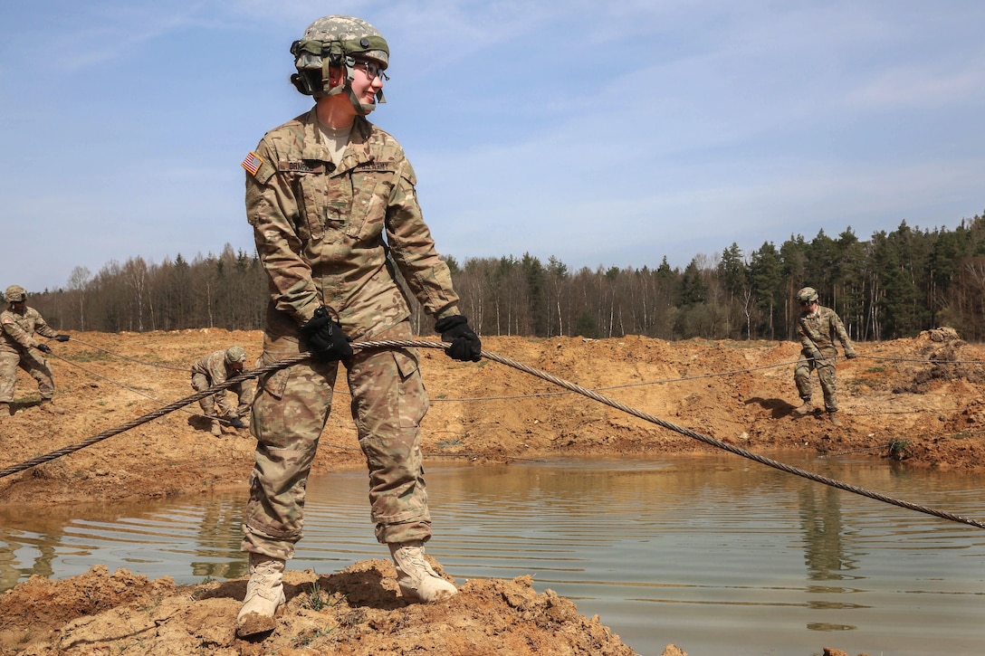 Soldiers unravel tow cables while participating in vehicle recovery training during Exercise Saber Junction 16 at Hohenfels, Germany, April 5, 2016. The soldiers are assigned to the 16th Sustainment Brigade and 173rd Brigade Support Battalion, 173rd Airborne Brigade. Saber Junction 16 is designed to evaluate the readiness of the Army’s Europe-based combat brigades to conduct unified land operations and promote interoperability in a joint, multinational environment.  Saber Junction 16 includes nearly 5,000 participants from 16 NATO and European partner nations. Army photo by Pfc. Randy Wren
