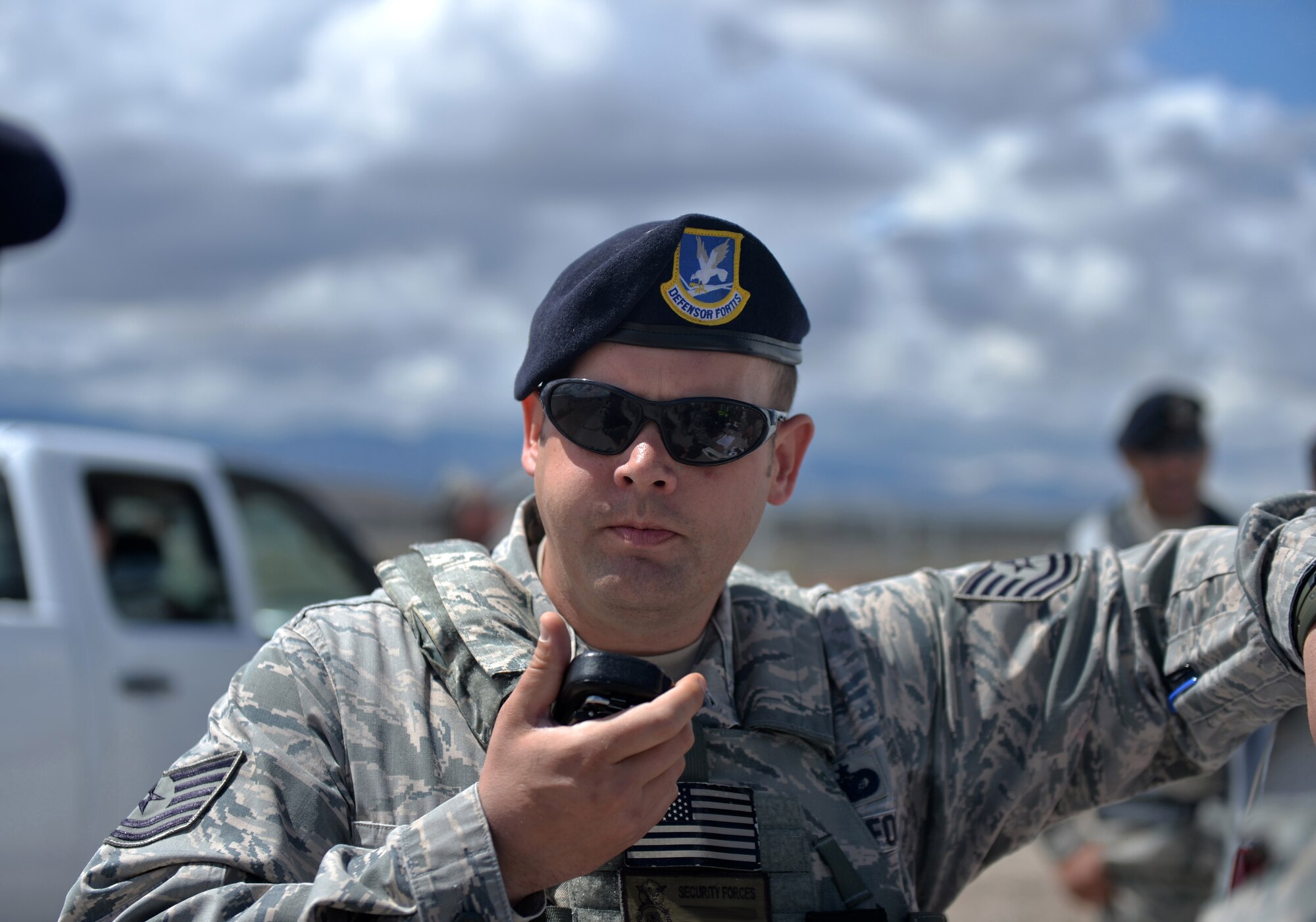 Tech. Sgt. Travis, 799th Security Forces member, coordinates with other security forces troops during a mass casualty exercise April 10, 2016, at Creech Air Force Base, Nevada. The 799th security forces protects and ensures the safety of Airmen who operate, support, and maintain the RPA operations. (U.S. Air Force photo taken by Airman 1st Class Kristan Campbell/Released) 