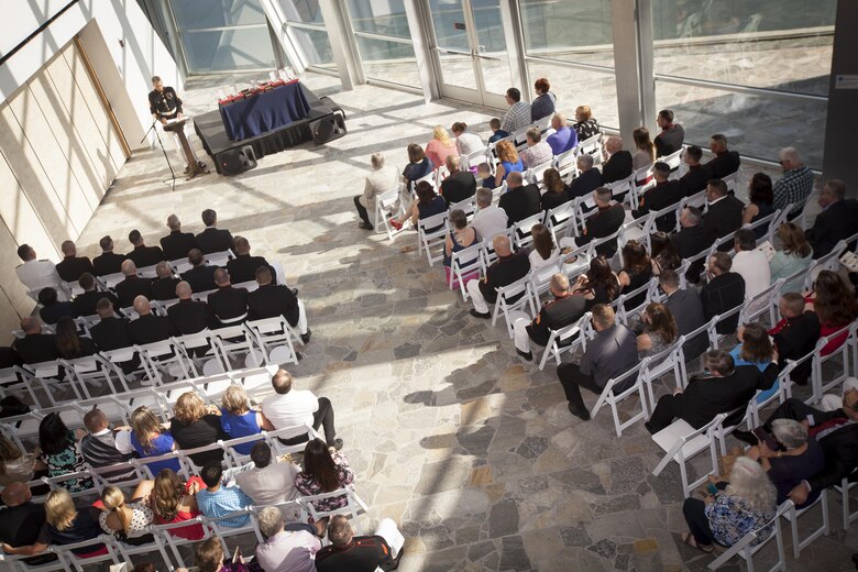Marines, family and friends attend a Purple Heart ceremony in honor of Gunnery Sgt.  Thomas J. Sullivan, Staff Sgt. David Wyatt, Sgt. Carson Holmquist and Lance Cpl. Squire Wells at the Hunter Museum of American Art in Chattanooga, Tenn., April 20, 2016. The Marines were honored for giving their lives to protect others when they were attacked by a gunman at the Naval Operational Support Center and Marine Corps Reserve Center in Chattanooga on July 16, 2015. (U.S. Marine Corps photo by MSgt. John Lee, II / Released) 