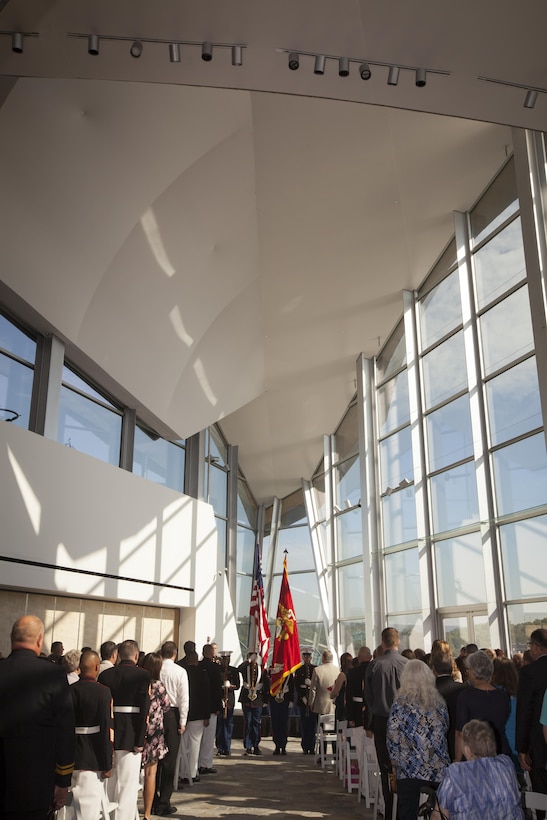 The Marines of Battery M, 3rd Battalion, 14th Marine Regiment, Marine Forces Reserve, present the colors during a Purple Heart ceremony held in honor of Gunnery Sgt.  Thomas J. Sullivan, Staff Sgt. David Wyatt, Sgt. Carson Holmquist and Lance Cpl. Squire Wells at the Hunter Museum of American Art in Chattanooga, Tenn., April 20, 2016. The Marines were honored for giving their lives to protect others when they were attacked by a gunman at the Naval Operational Support Center and Marine Corps Reserve Center in Chattanooga on July 16, 2015. (U.S. Marine Corps photo by MSgt. John Lee, II / Released)