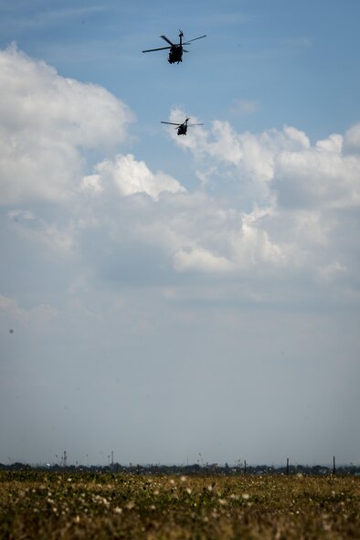 A U.S. Air Force HH-60G Pave Hawk helicopter, with the 33rd Rescue Squadron, Kadena Air Base, Japan, flies overhead after taking off from Clark Air Base, Philippines, April 19, 2016. Two HH-60Gs and four A-10C Thunderbolt IIs, with the 51st Fighter Wing, Osan Air Base, Republic of Korea, took off today marking the first mission in a several week long deployment. These missions promote transparency and safety of movement in international waters and airspace, showcasing the U.S. commitment to ally and partner nations and to the Indo-Asia-Pacific region’s continued stability now and for generations to come. (U.S. Air Force photo by Staff Sgt. Benjamin W. Stratton)